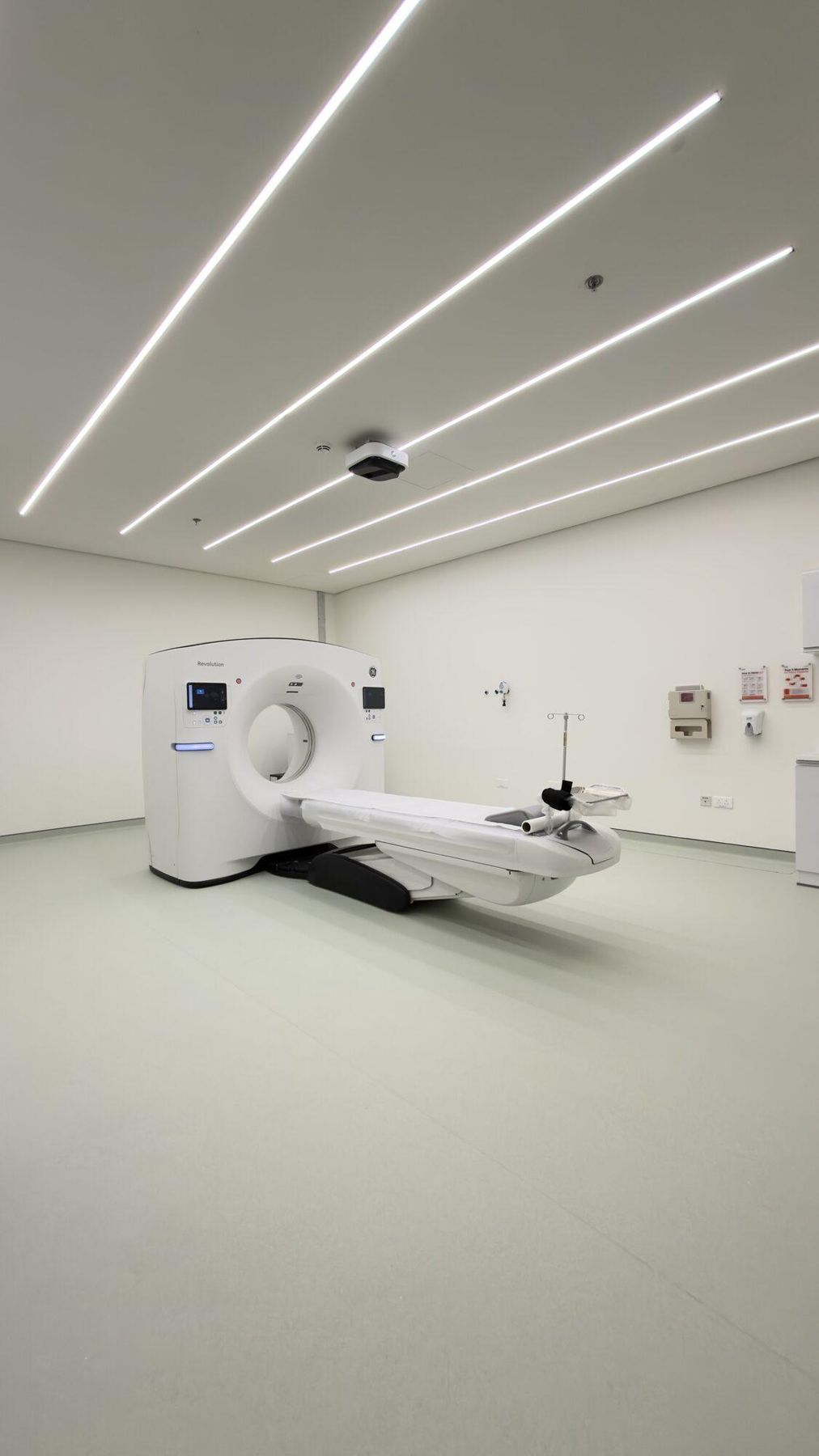 CT scanner in a bright imaging room